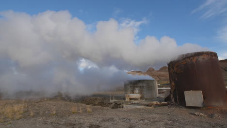Geothermal-Power-Plant-with-water-vapour-coming-out-of-a-chimney-pipe.-Iceland